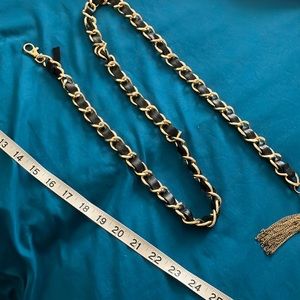 Gold Tone and Soft Black Leather Belt. 43 inches of belt. Can b single or wrap.